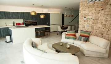 Resa estates Ibiza modern villa Cala llonga golf sale te koop livingroom.jpg